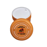 A container of Americas Carrot Sun Tan Papaya cream with a white lid and orange label, featuring product information and branding.