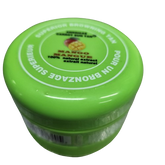 A container of Americas Carrot Sun Tan tanning cream with a green lid.