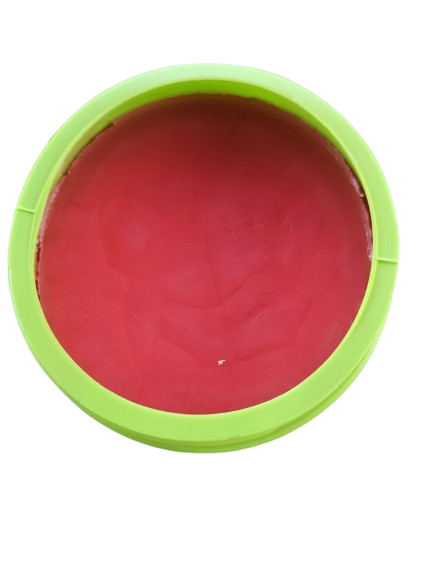 A container of open Americas Carrot Sun Tan tanning cream, featuring product information on the label.
