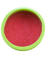 A container of open Americas Carrot Sun Tan tanning cream, featuring product information on the label.