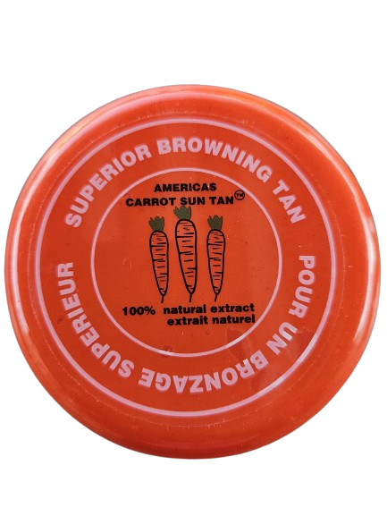 A container of Americas Carrot Sun Tan tanning cream with a red lid, featuring product information on the label.