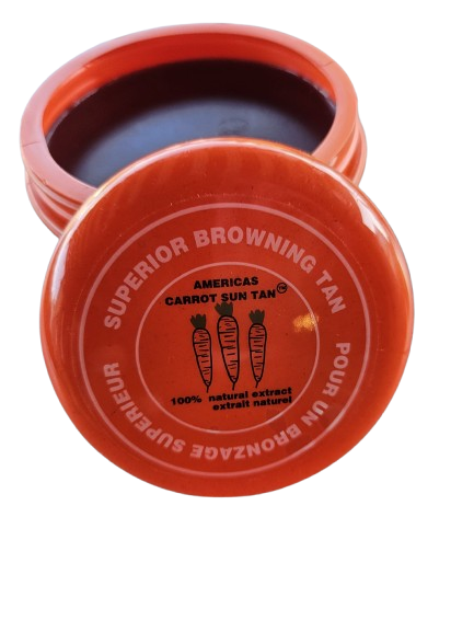 A container of Americas Carrot Sun Tan tanning cream with a red.