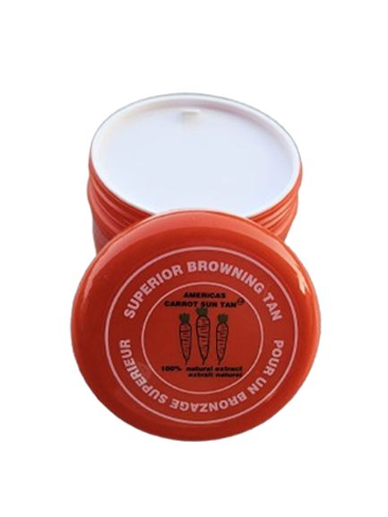 A container of Americas Carrot Sun Tan tanning cream with a red lid, featuring product information on the label.